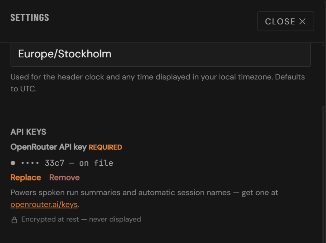 Settings modal showing an API key on file